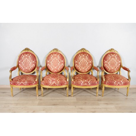 Cuatro sillones estilo Luis XVI en madera dorada