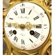 Reloj de bronce dorado estilo Luis XV
