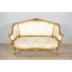 Sofá de madera dorada estilo Luis XV